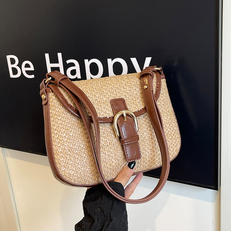 Korejska tkanina torbica tipa sedlo za žene, 2025 modna crossbody torbica s pletenim dizajnom od slame