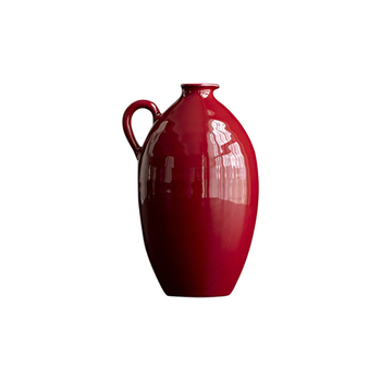 Dispenser ceramic pentru vin într-o nuanță oker-roșu și vas de încălzire, aranjament floral în stil chinezesc, cu o vază mică