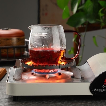 Cană mare în formă de semilună pentru ceai verde, din sticlă rezistentă la căldură, cu infuzor pentru ceai.