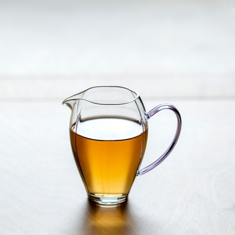 Ceasca de ceai cu mâner colorat din sticlă borosilicată, design modern și simplu pentru uz casnic, rezistentă la temperatură