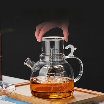 Ceainic din sticlă borosilikat de înaltă rezistență, cu filtru încorporat și separator de ceai, gură dreaptă și capac cupolă, inspirat de silueta unei păsări