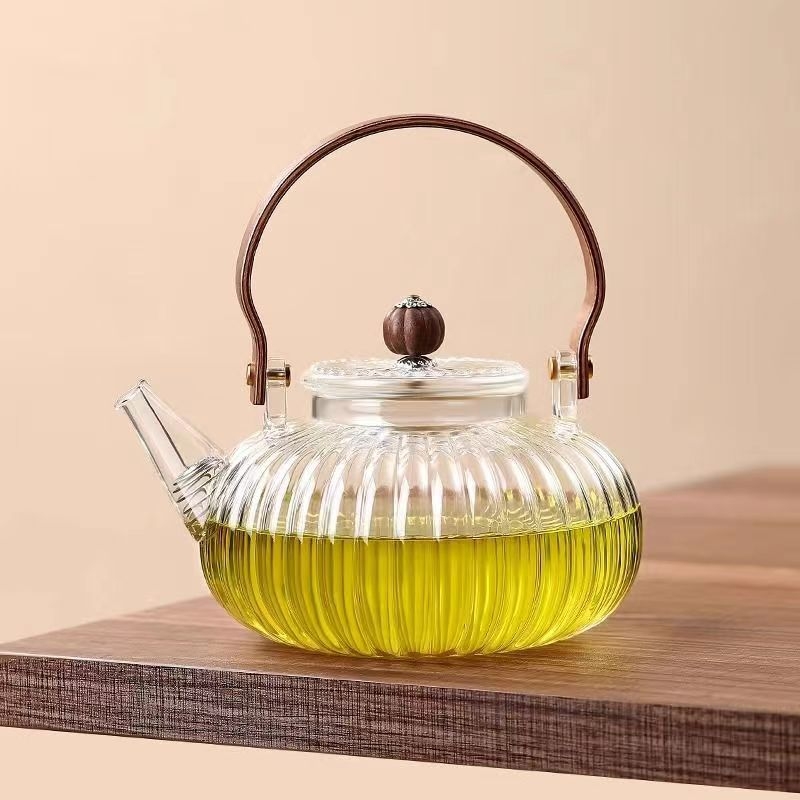 Ceainic din sticlă borosilicat rezistent la temperaturi înalte, cu filtru și mâner din lemn, pentru prepararea ceaiului acasă