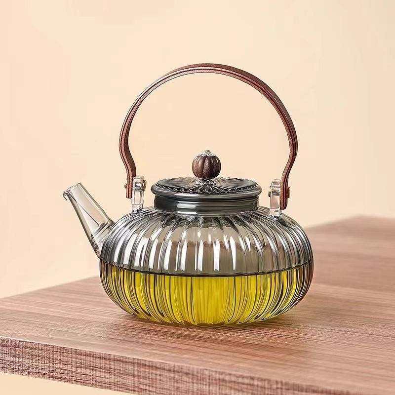 Ceainic din sticlă borosilicat rezistent la temperaturi înalte, cu filtru și mâner din lemn, pentru prepararea ceaiului acasă