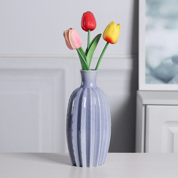 Vază ceramică minimalistă, în formă de carambolă, pentru decor acasă, potrivită pentru aranjamente florale proaspete în living și pe masă.