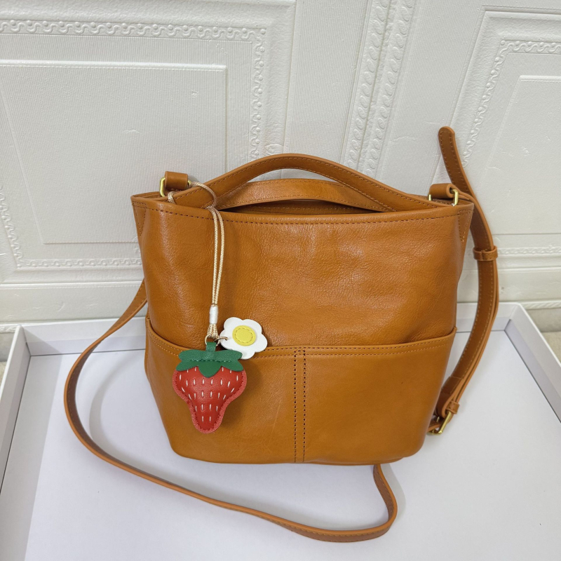 Ženska bucket torbica od prave kože, izdanje 2025, Crossbody, minimalistički dizajn, veliki kapacitet