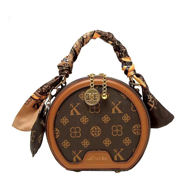 Ženska PU kožna mala okrugla crossbody torbica s otiskom, vintage stil – trend 2025