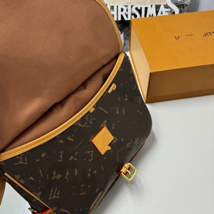 Vintage kožna torba tipa sedlo s monogramom Gemini Star, rabljena, crossbody torba