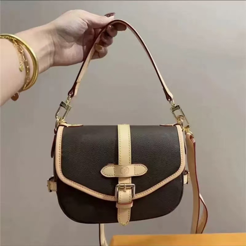 Vintage kožna torba tipa sedlo s monogramom Gemini Star, rabljena, crossbody torba