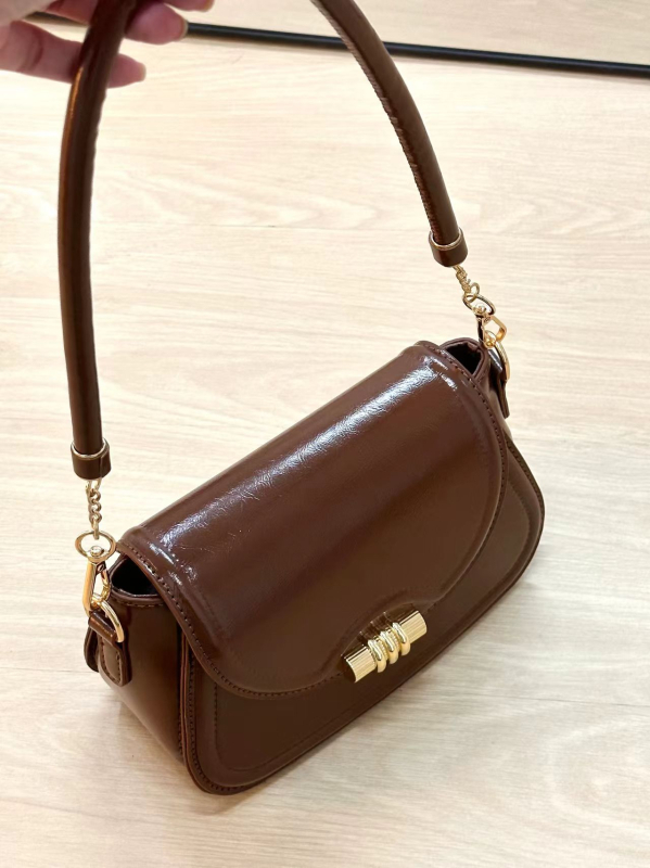 Ženska saddle torba, jesen-zima 2024, moderan gradski stil, visoka kvaliteta, crossbody ili torba preko ramena