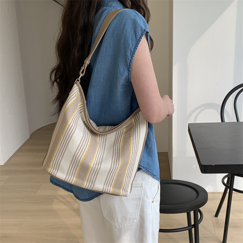 Ženska platnena tote torba, model 2026, moderna i svestrana, velika zapremina, za svakodnevnu upotrebu, nosi se na rame ili crossbody