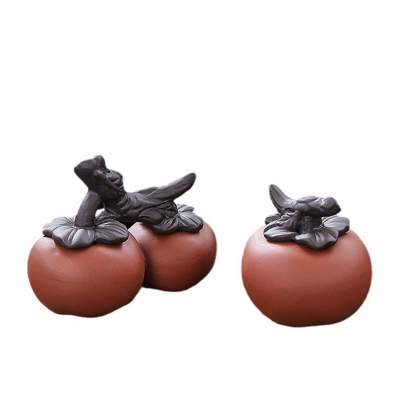 Ornament ceramic pentru ceai – Tea Pet, în formă de persimon, cu capac