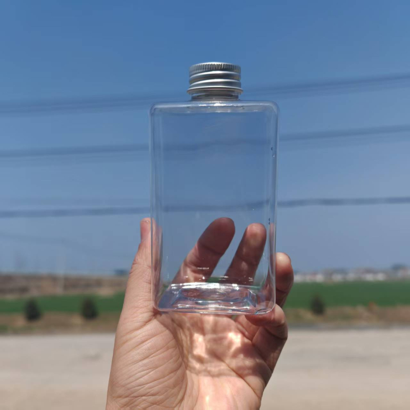 350 ml PET boca pića s aluminijskim poklopcem, plosnatog četvrtastog dizajna za svježe iscijeđene sokove i čajeve