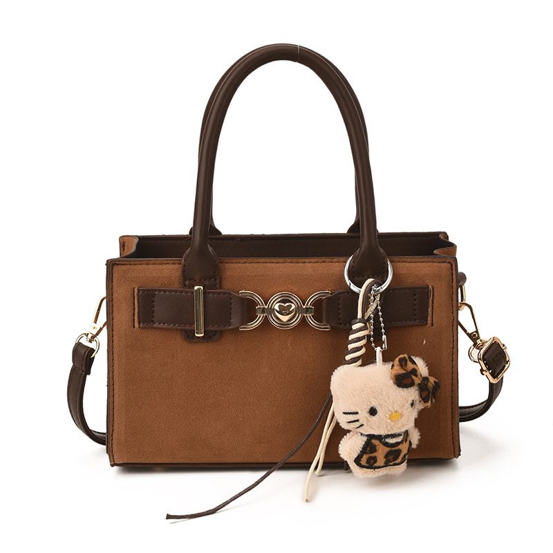 Ženska mala kvadratna torbica u minimalističkom stilu, crossbody torba za rame s retro šarmom
