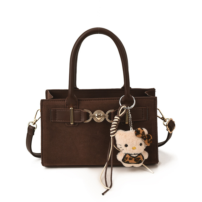 Ženska mala kvadratna torbica u minimalističkom stilu, crossbody torba za rame s retro šarmom