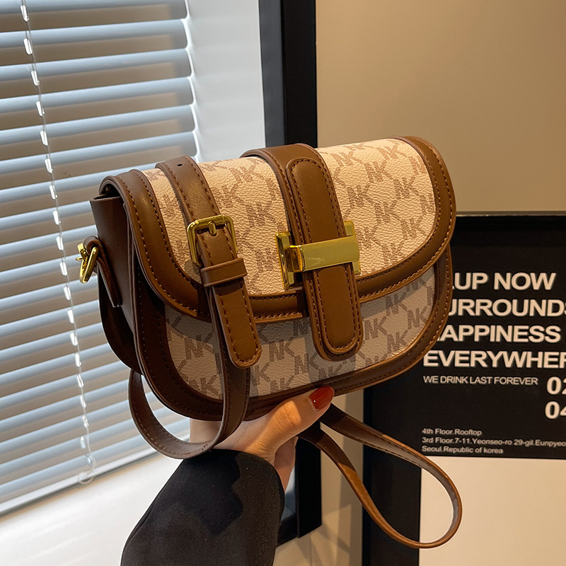 Ženska Saddle torba, jesen-zima 2026, vintage visokog kvaliteta, kompaktna crossbody torba
