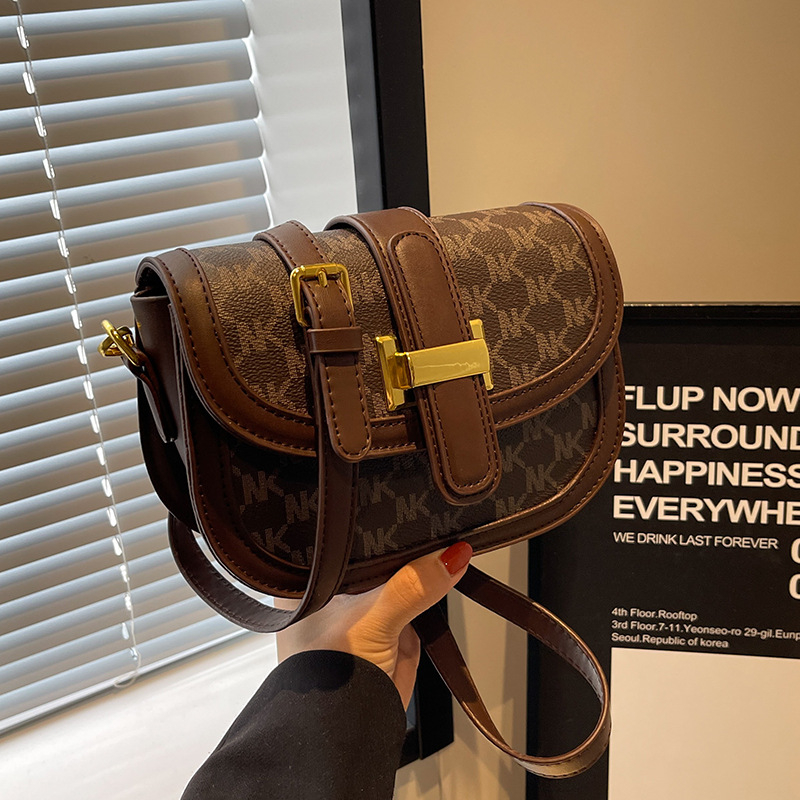 Ženska Saddle torba, jesen-zima 2026, vintage visokog kvaliteta, kompaktna crossbody torba