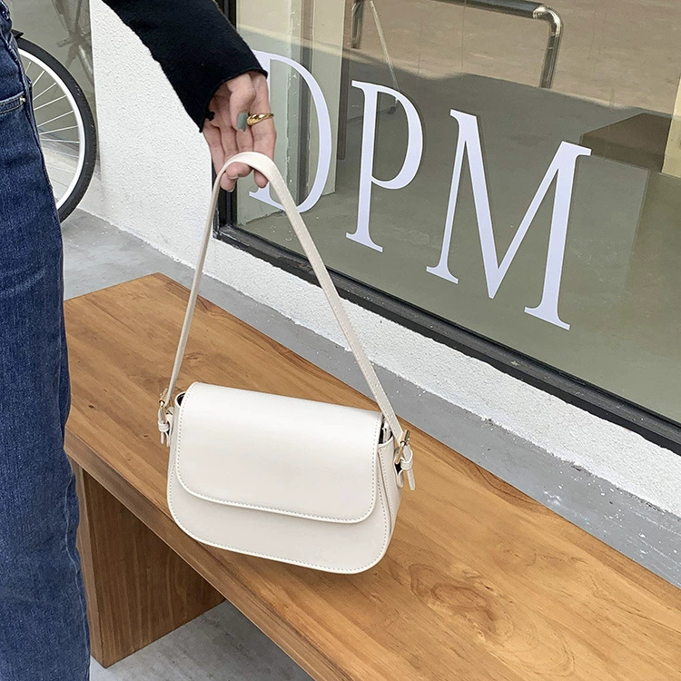 Ženska saddle torba s korejskim nadahnućem, nosiva ispod pazuha i kao crossbody, jednostavan retro dizajn