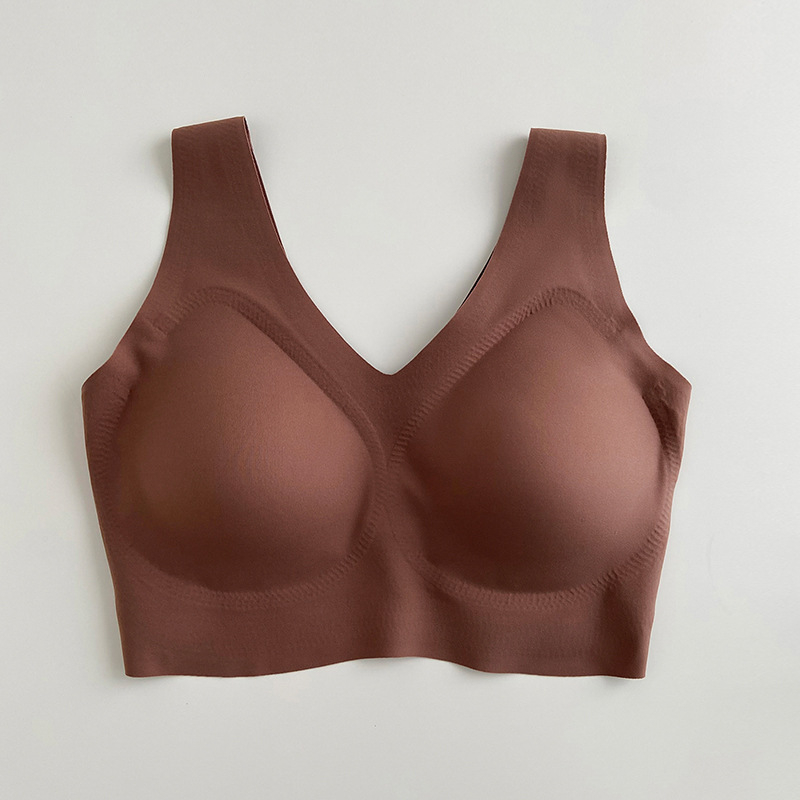 Jednodijelni bezšivni ženski grudnjak s latexnim čašicama i podstavom od mulberijeve svile, vest stil.