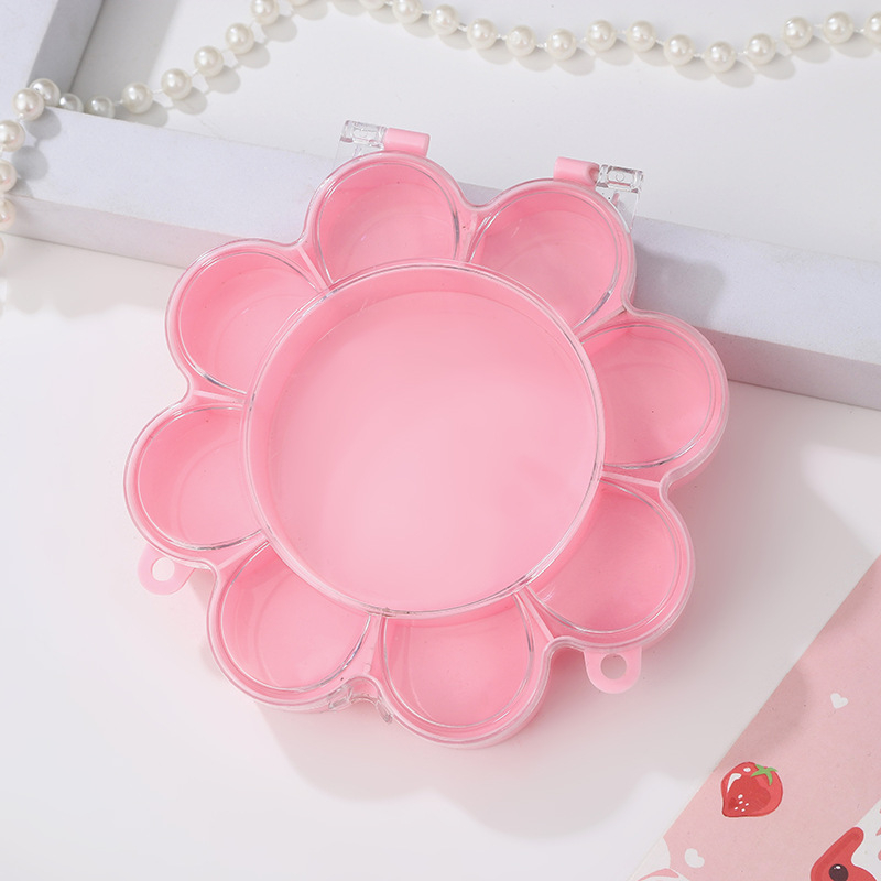 Cutie transparentă din plastic cu floare roz și iepuraș, capac rabatabil, compartimente pentru bijuterii și accesorii, design în stil castel