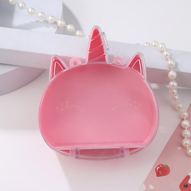 Cutie transparentă din plastic cu floare roz și iepuraș, capac rabatabil, compartimente pentru bijuterii și accesorii, design în stil castel