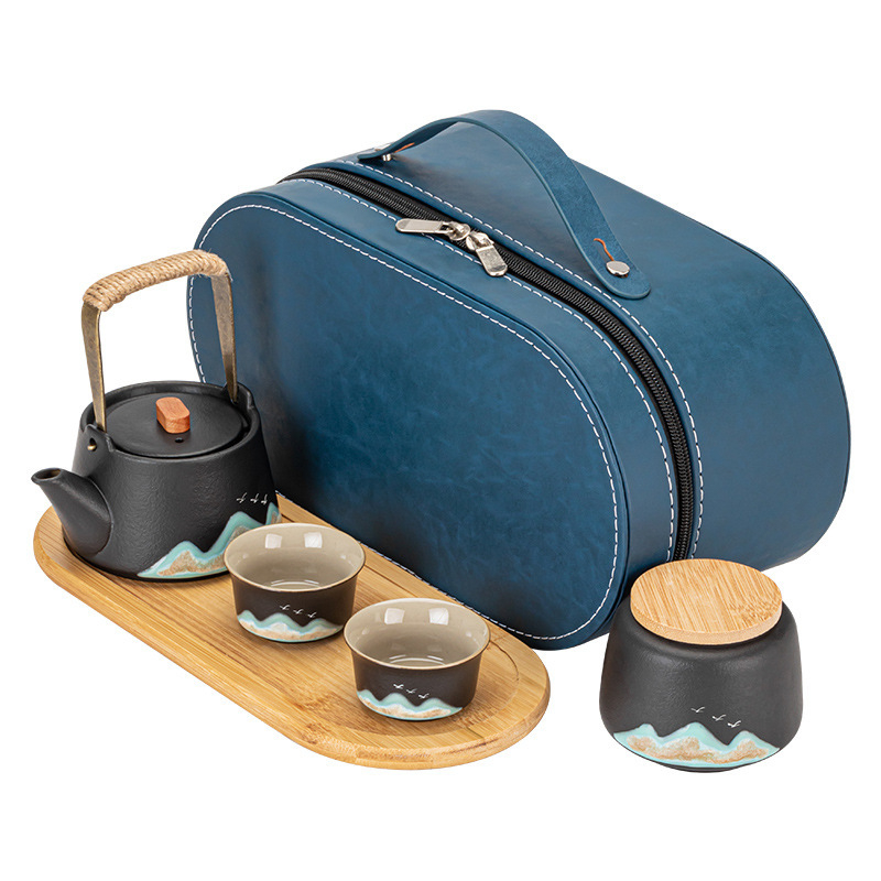Set portabil de ceai ceramic pentru călătorii — un ceainic și două cești