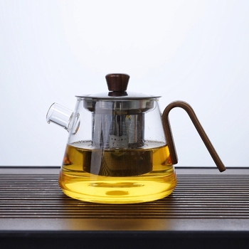 Ceainic din sticlă borosilicat rezistentă la temperaturi înalte, cu mâner din lemn și infuzor din oțel, compact pentru birou