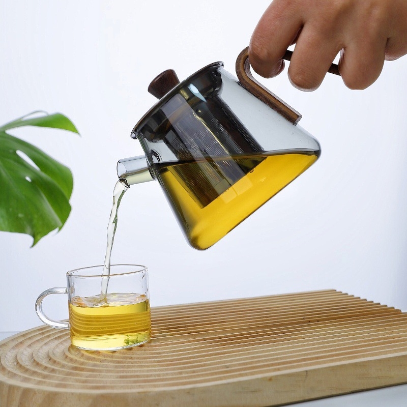 Ceainic din sticlă borosilicat rezistentă la temperaturi înalte, cu mâner din lemn și infuzor din oțel, compact pentru birou