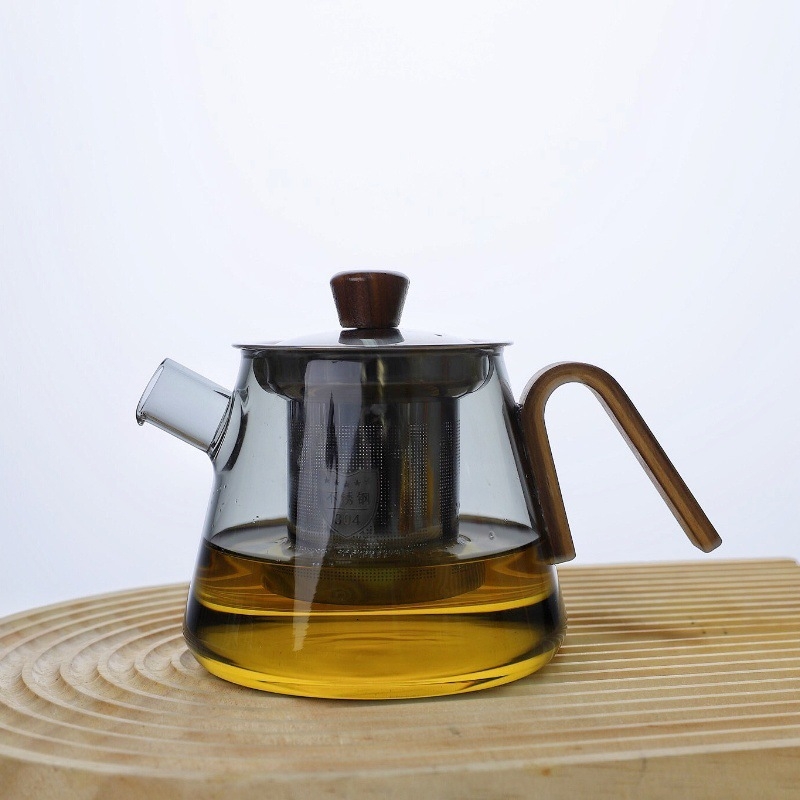 Ceainic din sticlă borosilicat rezistentă la temperaturi înalte, cu mâner din lemn și infuzor din oțel, compact pentru birou