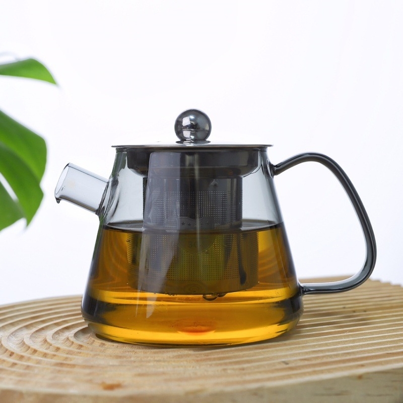 Ceainic din sticlă borosilicat rezistentă la temperaturi înalte, cu mâner din lemn și infuzor din oțel, compact pentru birou