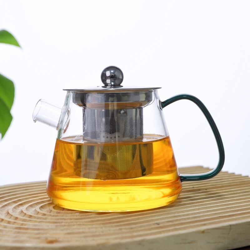 Ceainic din sticlă borosilicat rezistentă la temperaturi înalte, cu mâner din lemn și infuzor din oțel, compact pentru birou