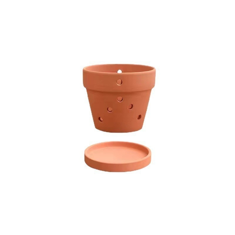 Ghiveci de flori din ceramică roșie cu găuri laterale, respirabil, cu capacitate de absorbție a apei; poate fi montat pe perete, pe birou sau pe podea