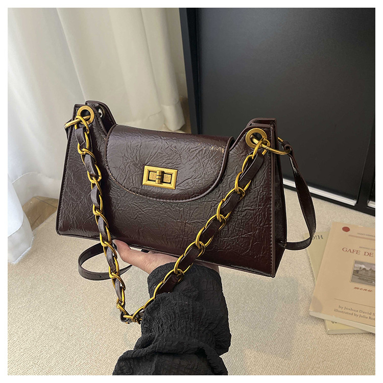 Ženska mini kvadratna torbica s lancem, korejski stil, proljeće 2026, crossbody torba s blagim luksuzom