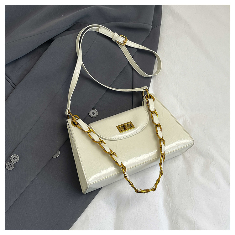 Ženska mini kvadratna torbica s lancem, korejski stil, proljeće 2026, crossbody torba s blagim luksuzom