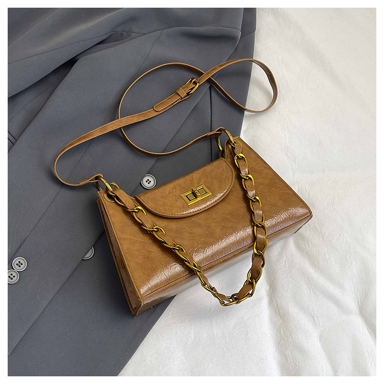 Ženska mini kvadratna torbica s lancem, korejski stil, proljeće 2026, crossbody torba s blagim luksuzom