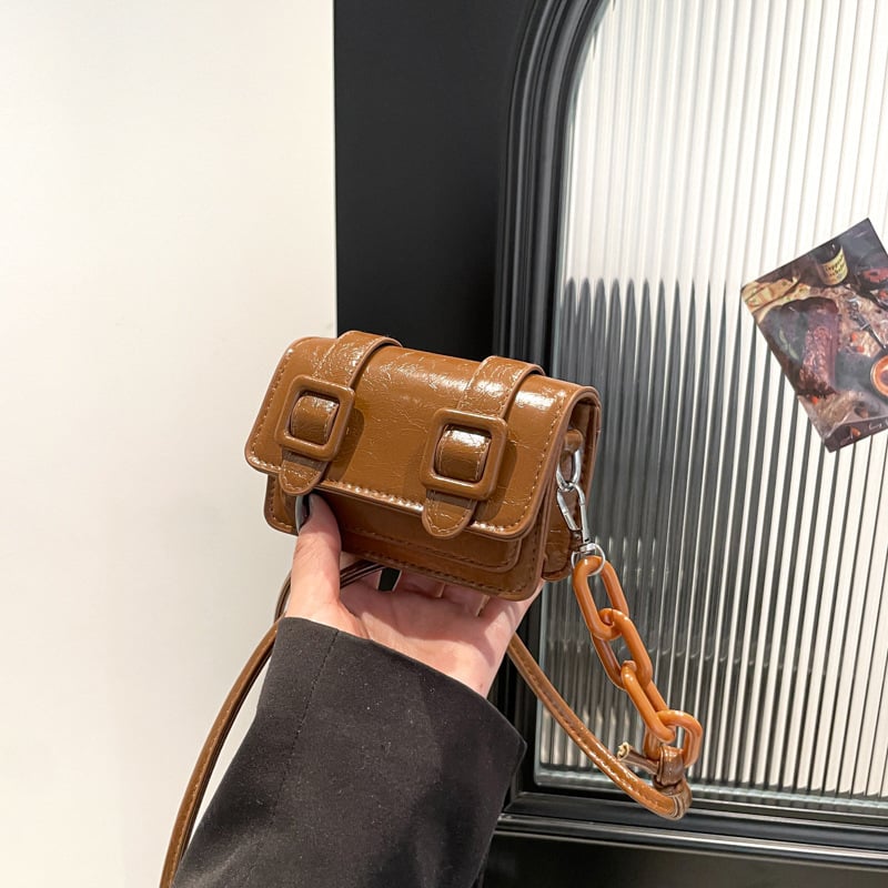Mini ženska crossbody torba s laserskom lancem, ljeto 2025, vrhunska tekstura, mala kvadratna torba s džepom za ruž
