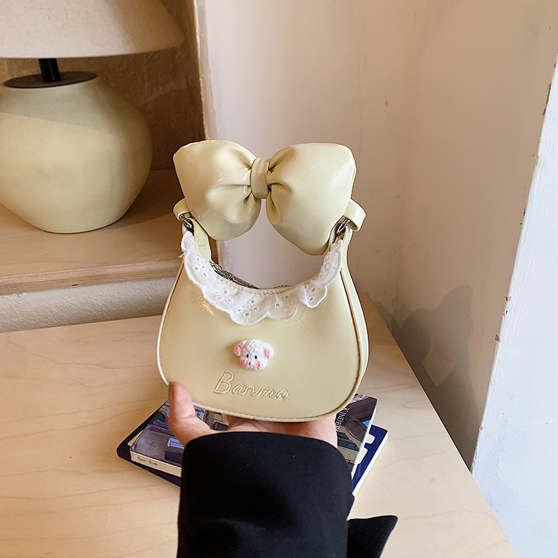 Izvanredna mini ženska torbica preko ramena, novi model 2026., svestrana za proljeće i ljeto, dumpling stil, PU materijal, zatvarač na zip.