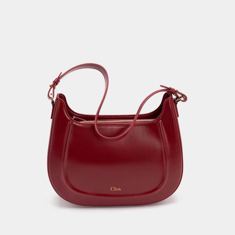 Crvena ženska kožna torbica u stilu Saddle Bag, malih veličina