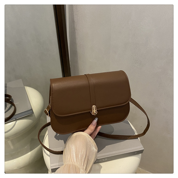 Vrhunska teksturirana baguette torba, novi model 2025, lagana luksuzna kaišna torba, podlaktna sedla torba, svestrana preko ramena i crossbody za žene