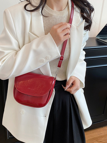 Ženska sedlasta torbica preko ramena, mala crossbody, PU koža, 2026 gradski stil