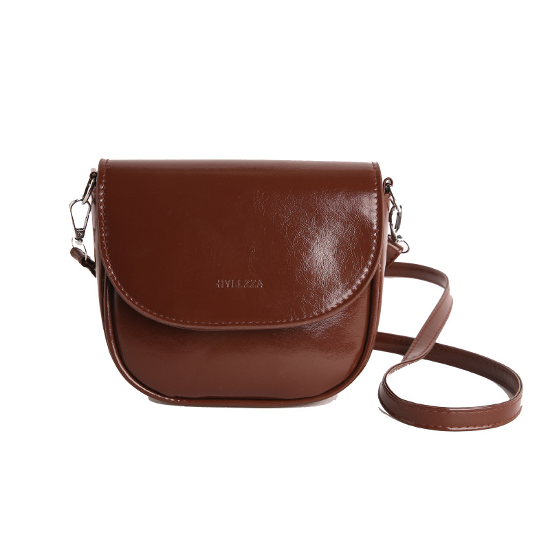 Ženska sedlasta torbica preko ramena, mala crossbody, PU koža, 2026 gradski stil