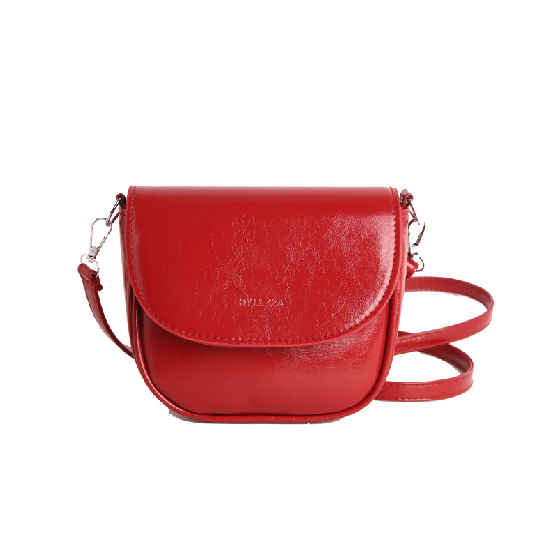 Ženska sedlasta torbica preko ramena, mala crossbody, PU koža, 2026 gradski stil