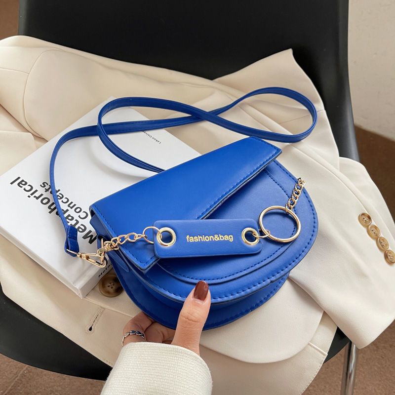 Ženska crossbody torbica s višenamjenskim dizajnom, nišnog stila, kontrastne boje, saddle torba, mala torba za rame