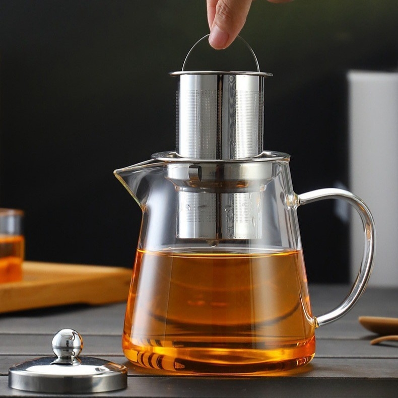 Ceainic din sticlă borosiliată, rezistent la căldură, cu design triunghiular și filtru din oțel inoxidabil