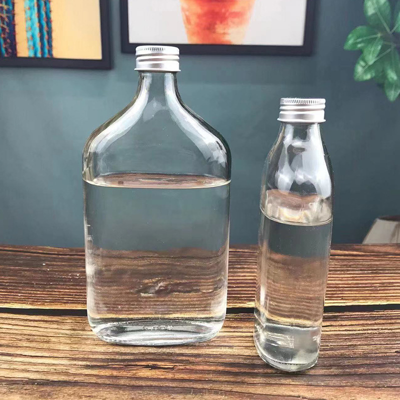 Staklene bočice za piće s mat završetkom i malim otvorom, set kapaciteta 50 ml, 100 ml, 200 ml, 250 ml, 350 ml i 500 ml, pogodne za bijelo vino, u kartonskom pakiranju u obliku jajeta