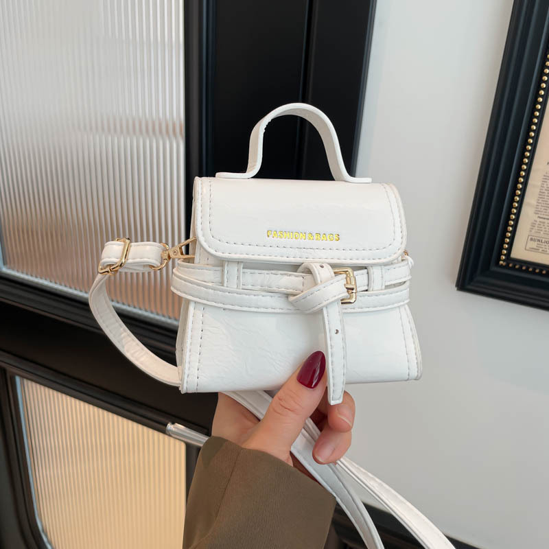 2026 nova vintage mini torbica od uljne kože, nišni dizajn, ručno nošenje, ukrasna kopča s remenom, crossbody torbica za ruž