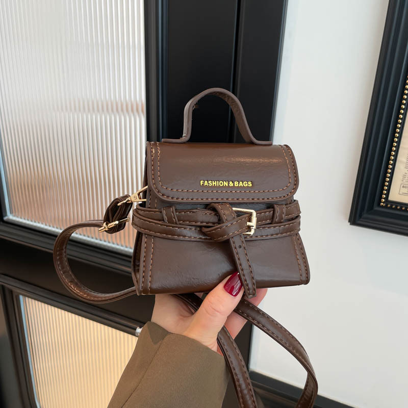 2026 nova vintage mini torbica od uljne kože, nišni dizajn, ručno nošenje, ukrasna kopča s remenom, crossbody torbica za ruž