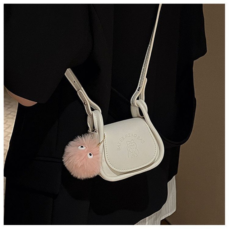 Mini ženska crossbody torba u obliku sedla, ljeto 2023, teksturiran dizajn