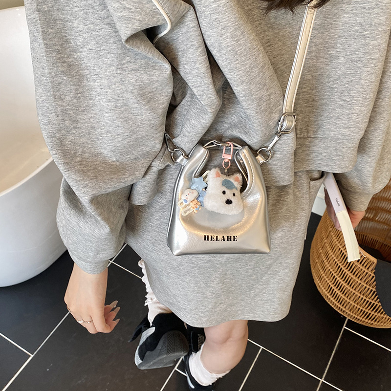 Mini ženska crossbody torbica u srebrnoj boji, jedinstven dizajn, 2025 novo izdanje, torbica za ruž i slušalice