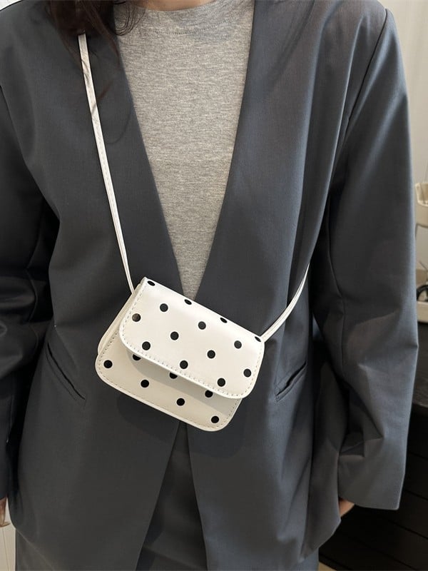Mini crossbody torbica s točkastim uzorkom i elegantnom teksturom