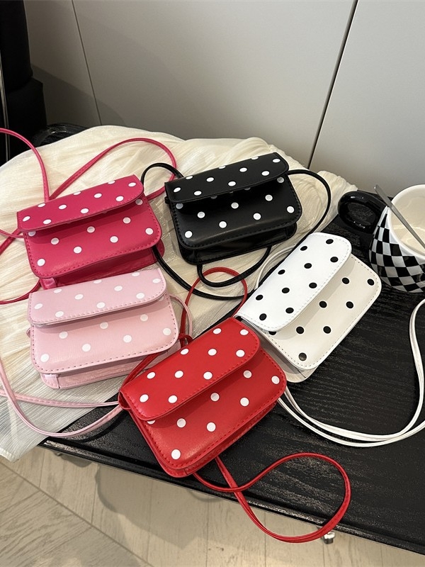 Mini crossbody torbica s točkastim uzorkom i elegantnom teksturom